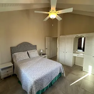https://ixoras-beach-apartments.comcaribbean.com